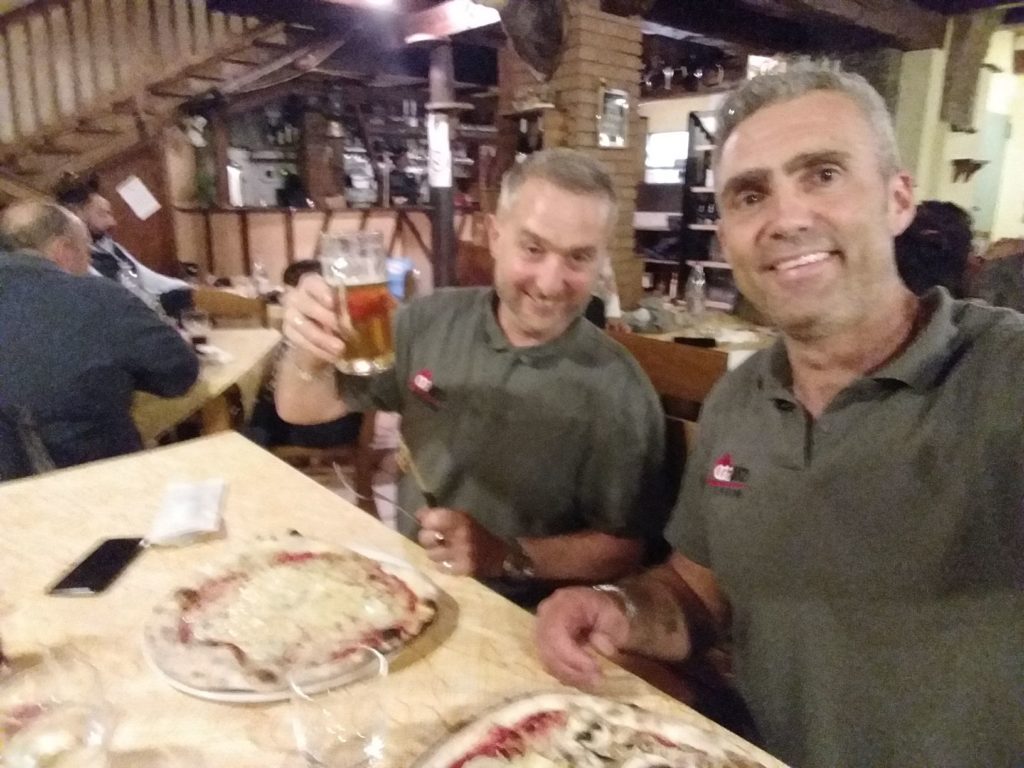 Relaxing with a pizza after a job well done
